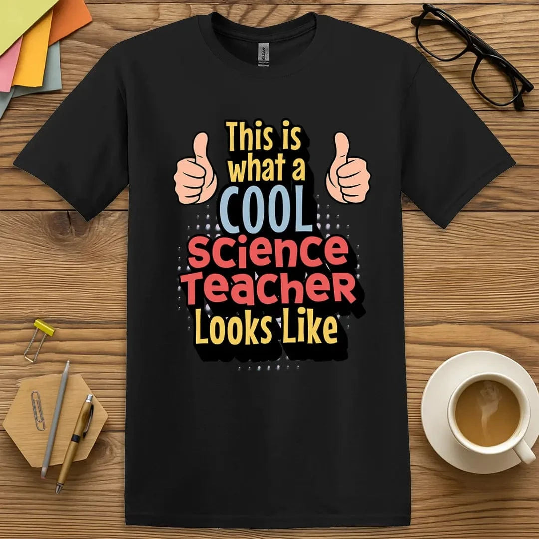 Black Color T-Shirt with "This Is What a Cool Science Teacher Looks Like" design featuring thumbs-up graphics and bold classroom energy.