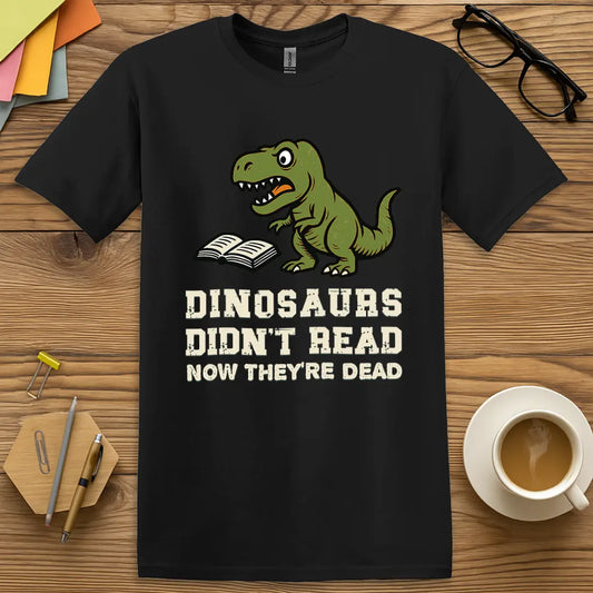 Black T-shirt with "Dinosaurs Didn't Read Now They're Dead" design featuring clean contrast and witty literacy joke for teachers.