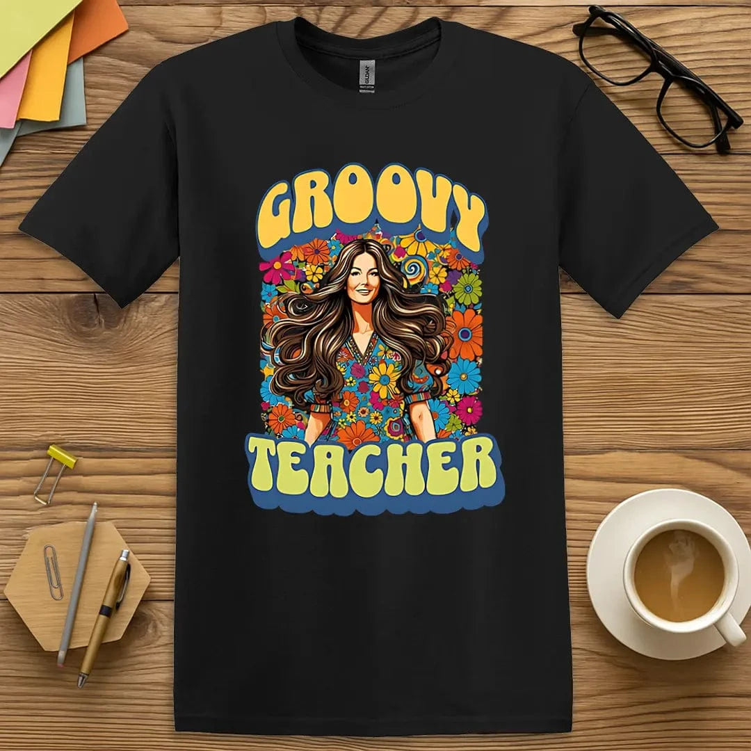 Black Color T-shirt with "Groovy Teacher" design showing vibrant flower power theme and bold classroom confidence.