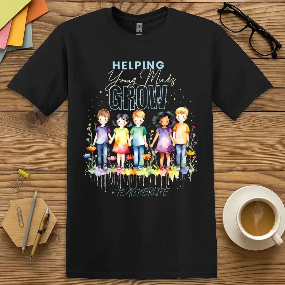 Black Color T-shirt with "Helping Young Minds Grow" design offering bold floral and nurturing teacher vibes.
