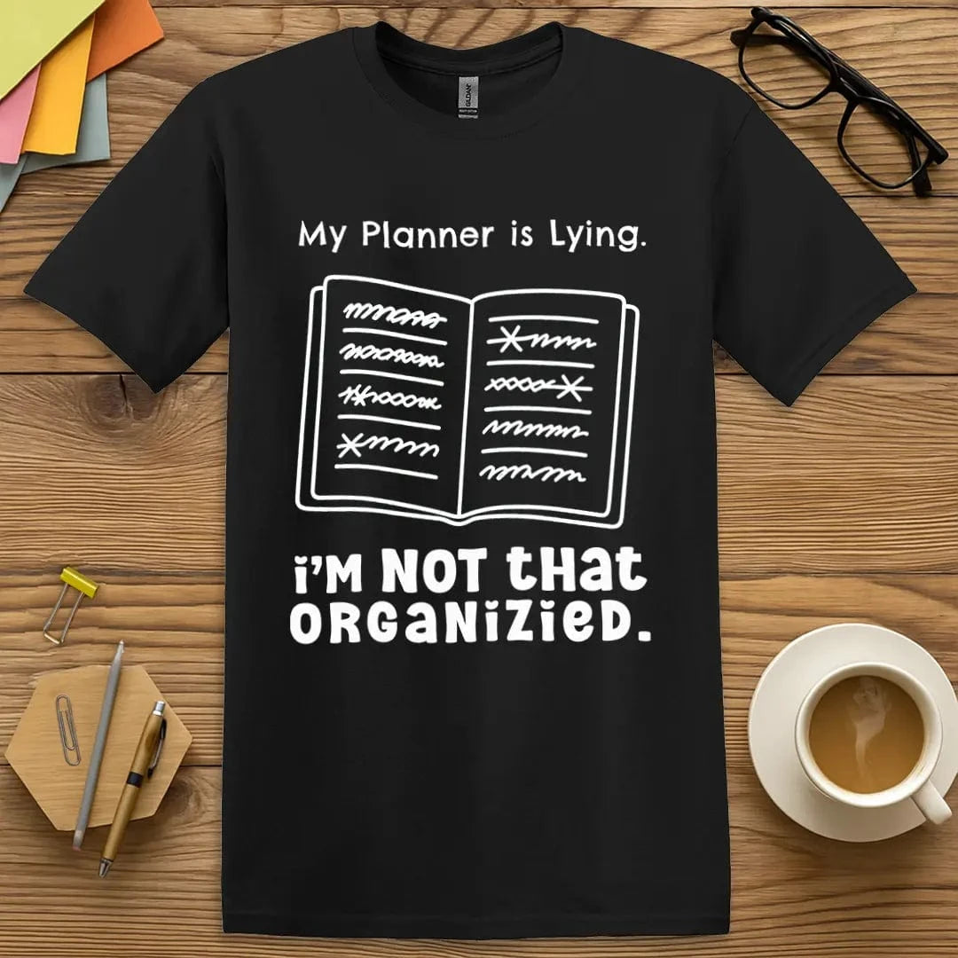 Black Color T-shirt with "My Planner is Lying. I'm Not That Organized." design offering sleek chaos and honest classroom commentary.