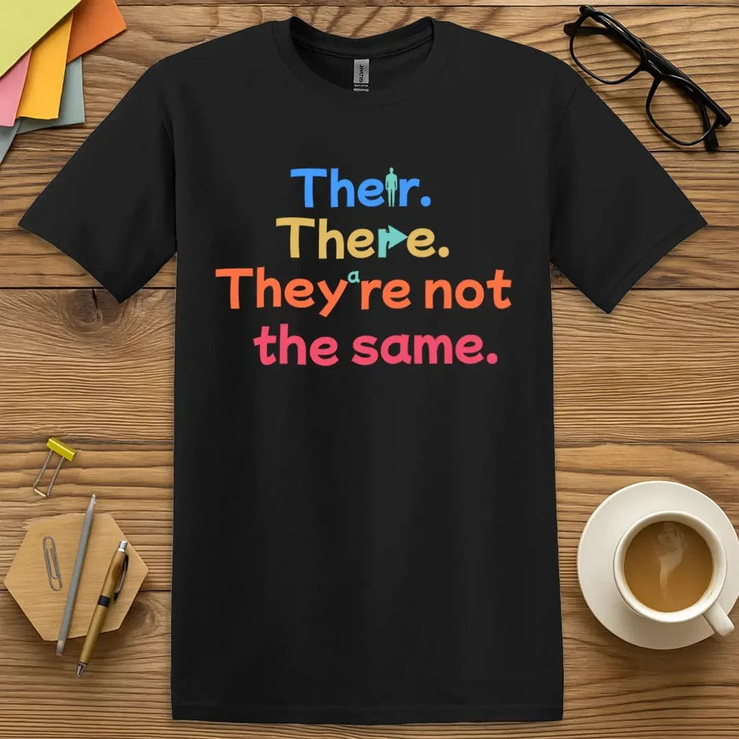 Black Color T-shirt with "Their. There. They're not the same." design in bright colors for grammar humor.