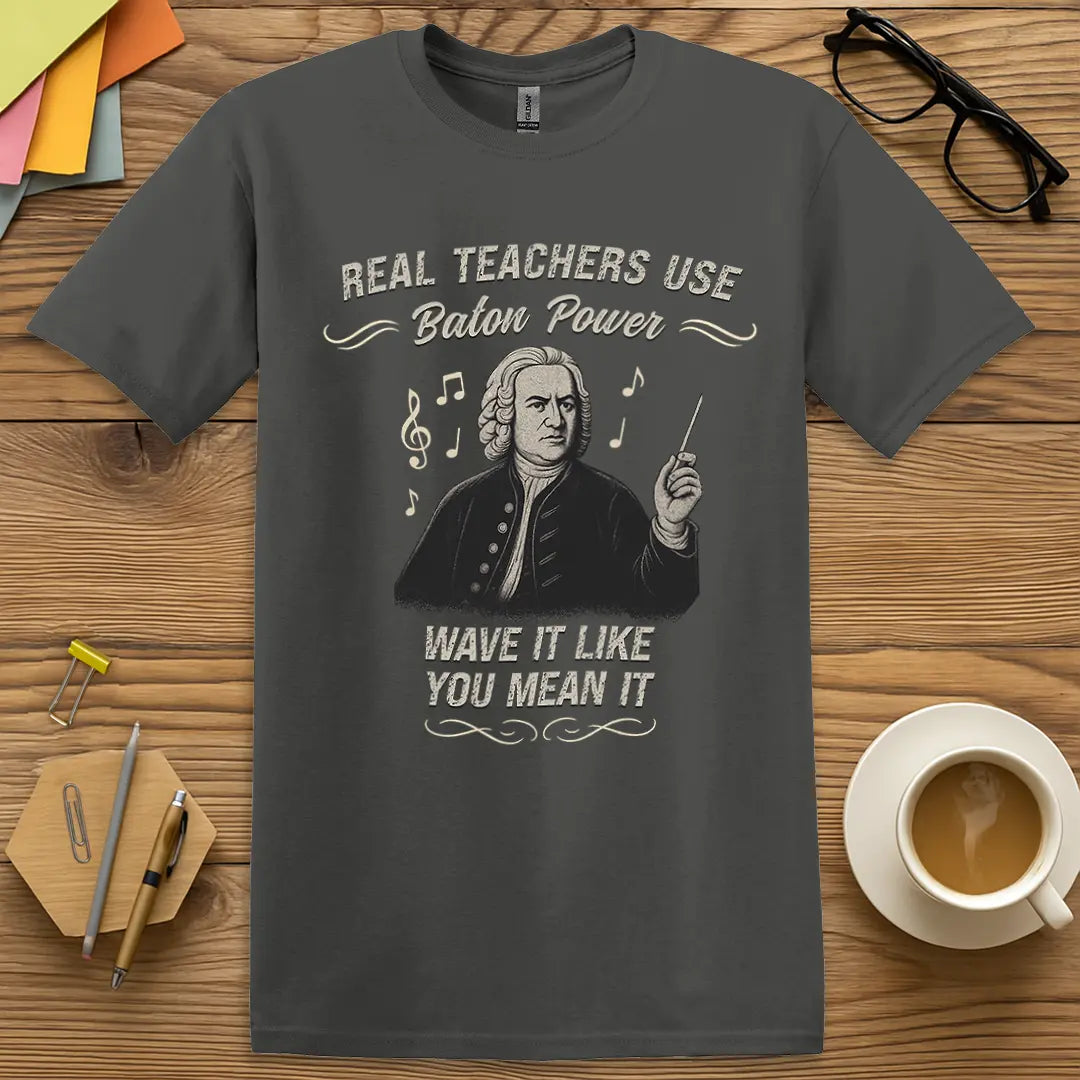 Charcoal Color T-shirt with "Real Teachers Use Baton Power - Wave It Like You Mean It" design featuring vintage conductor and musical humor.