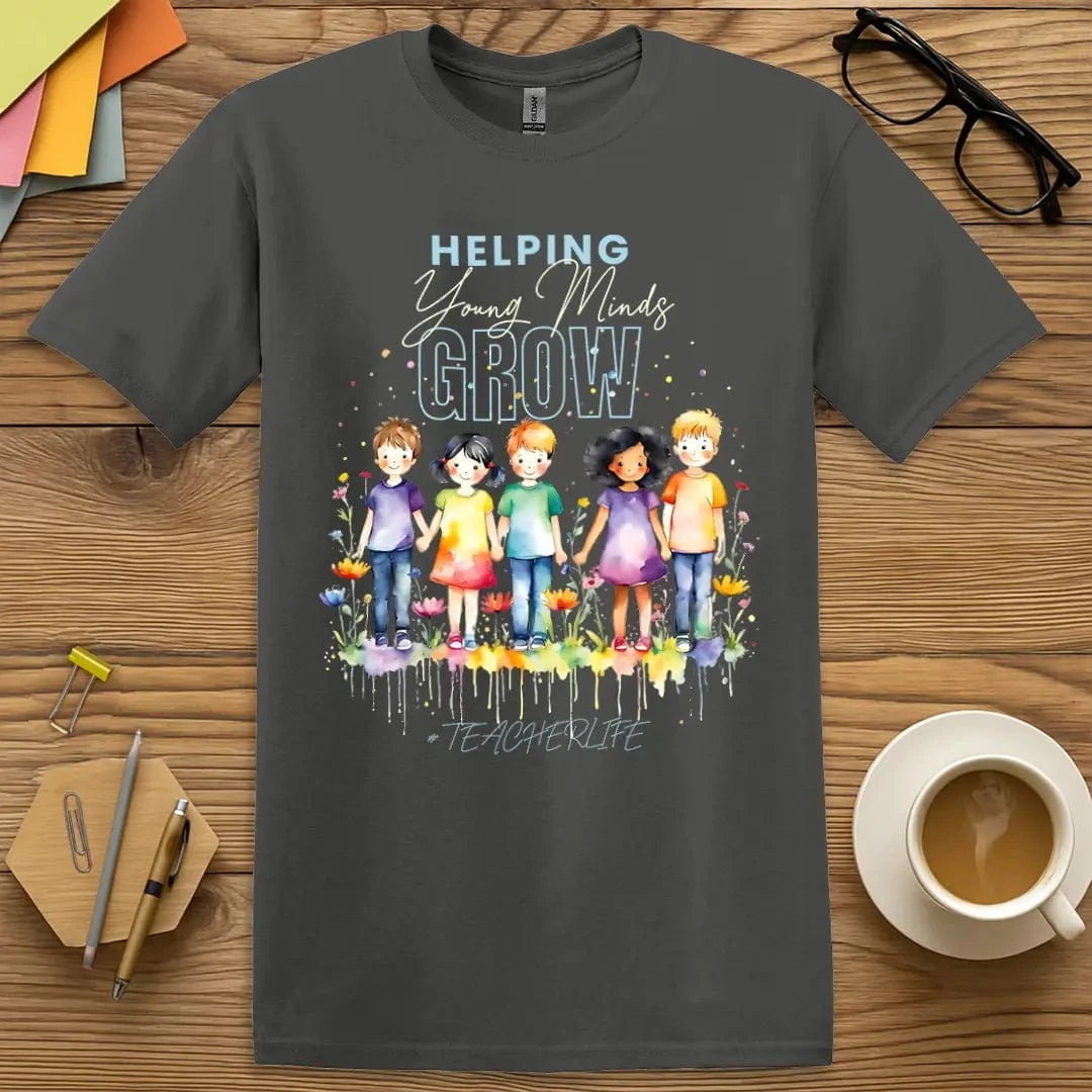 Charcoal Color T-shirt with "Helping Young Minds Grow" design showcasing diverse student illustration and classroom growth theme.