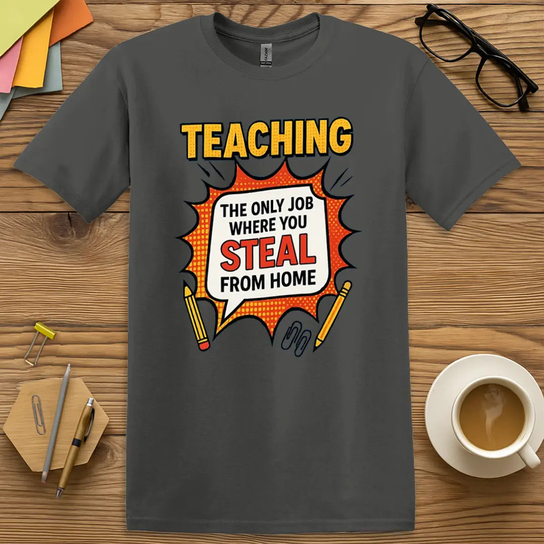Charcoal T-shirt with "Teaching: Steal From Home" design showcasing comic flair and bold relatable text.