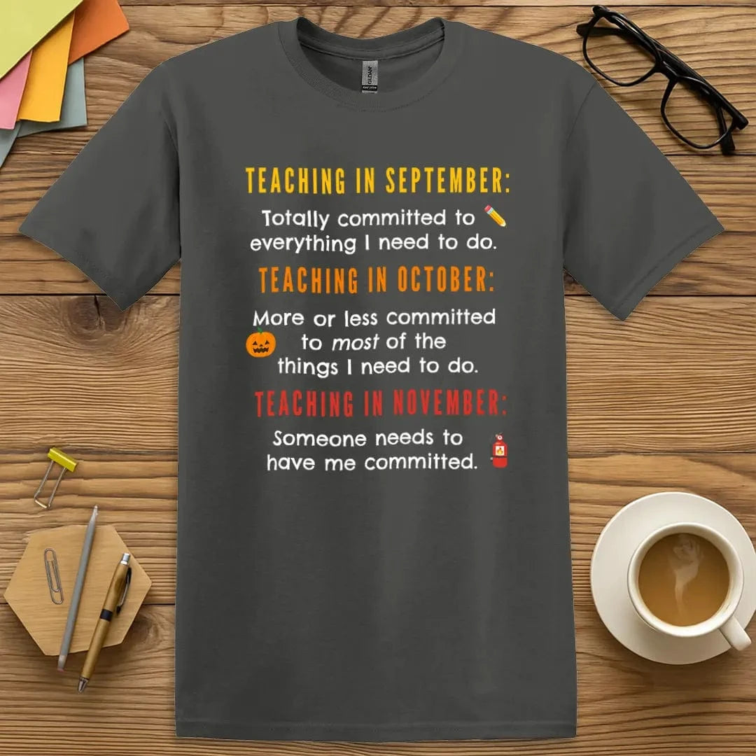 Charcoal Color T-shirt with "Teaching in September... October... November..." design capturing the back-to-school to burnout transition.