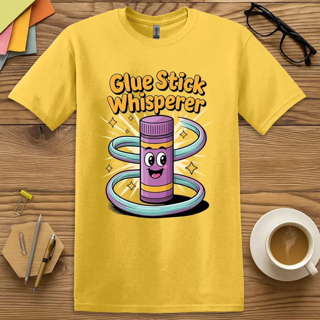 Daisy Glue Stick Whisperer T-Shirt – Bright and cheerful classroom favorite for teachers who turn chaos into crafts and glue into gold.