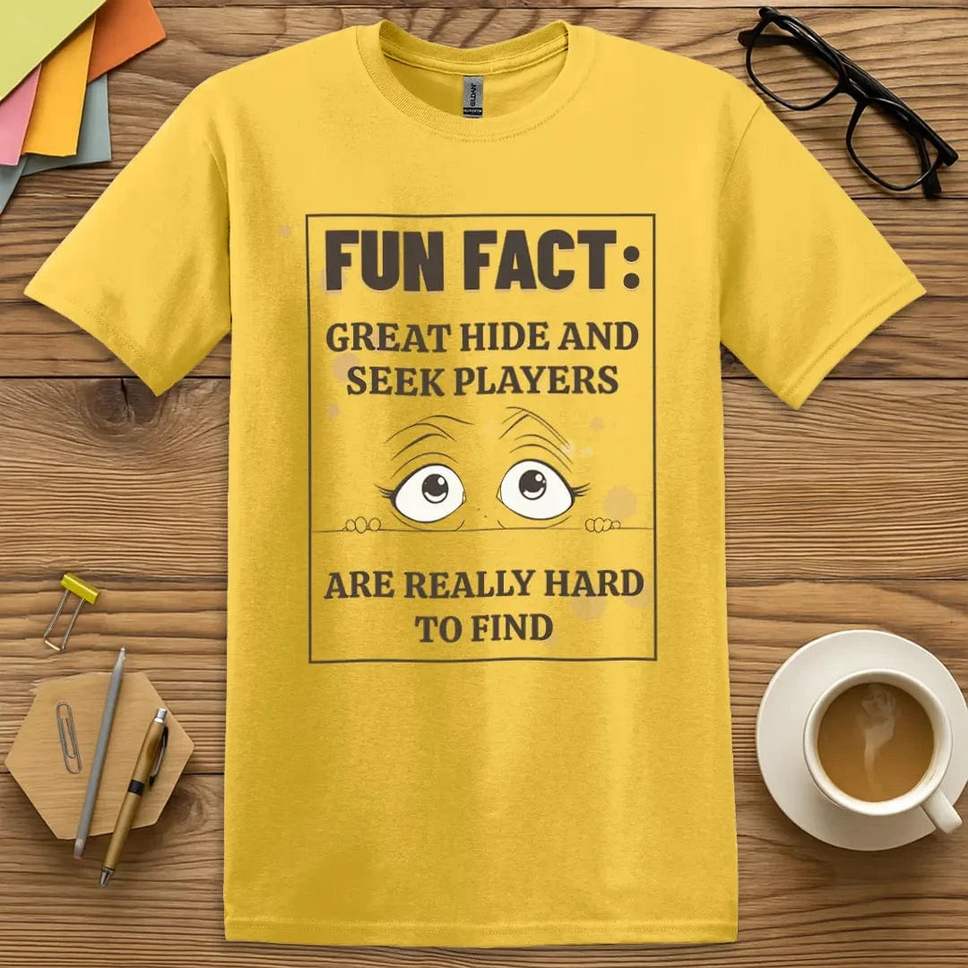 Daisy Color T-Shirt with "Fun Fact: Great Hide and Seek Players Are Really Hard to Find" design showing playful yellow tone and cheeky classroom fun.