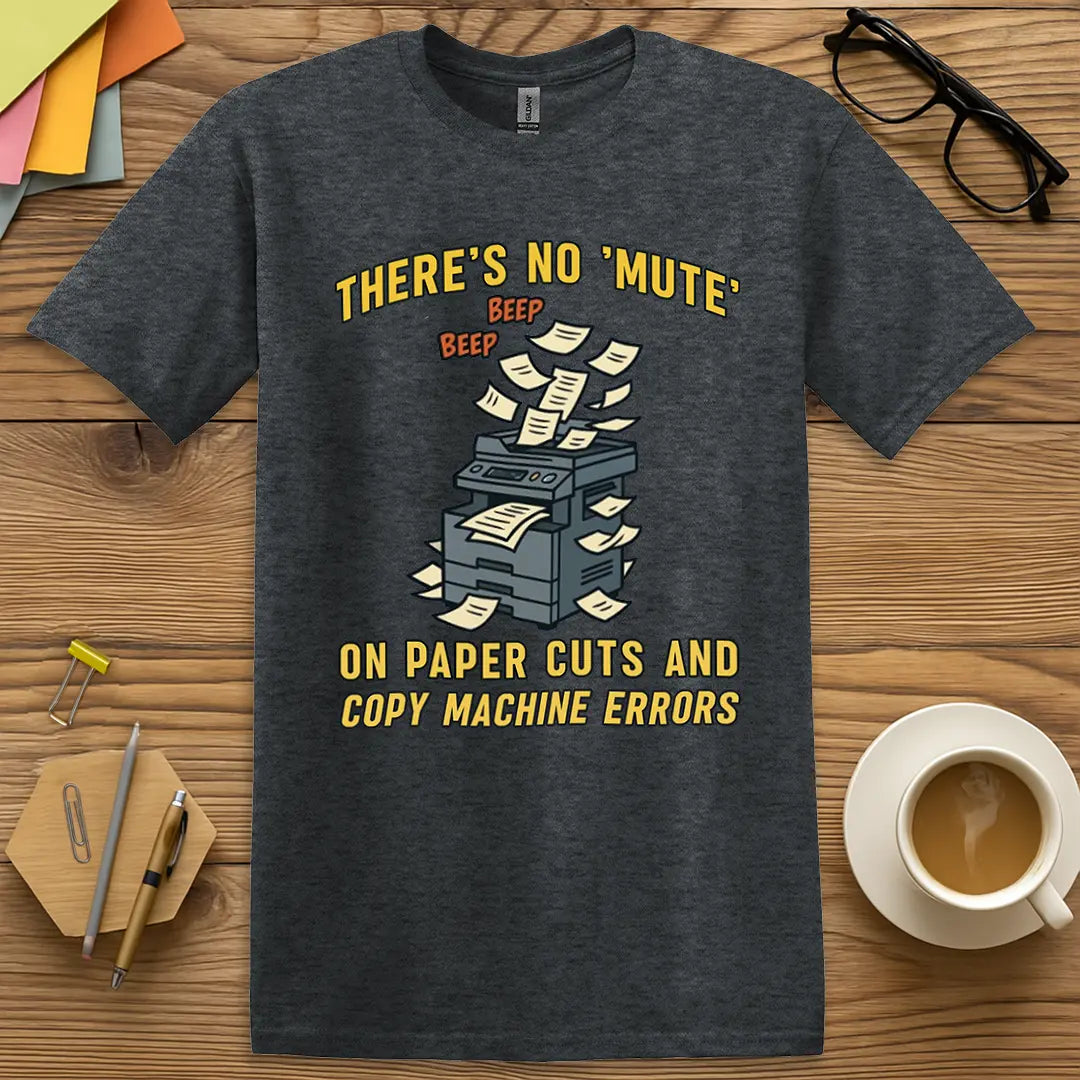 Dark Heather Color T-Shirt with "There's No 'Mute' on Paper Cuts and Copy Machine Errors" design bringing humor to staff room frustrations.
