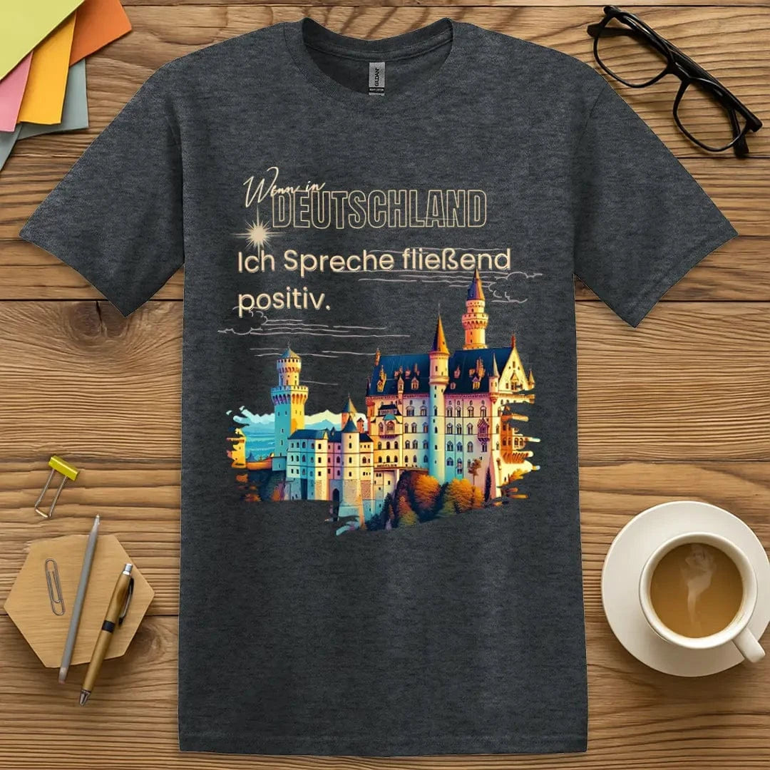 Dark Heather T-shirt with “Ich spreche fließend positiv” design featuring soft texture and smart classroom energy