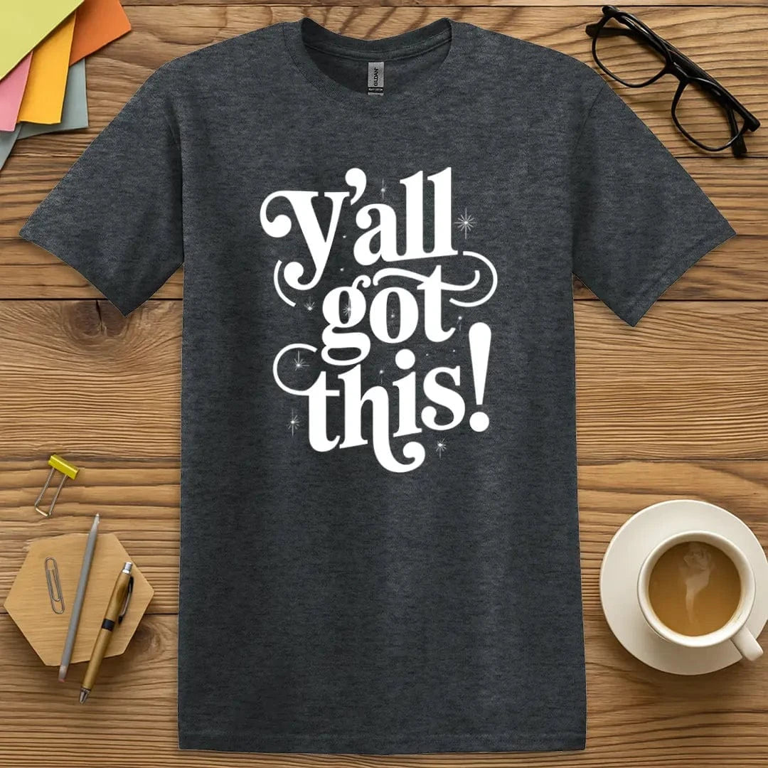 Dark Heather T-shirt with “Y’all Got This!” design featuring bold white lettering and sparkly accents for motivational classroom energy