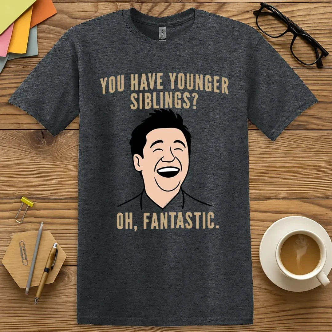 Dark Heather T-shirt with “Younger Siblings? Oh. Fantastic.” design for teachers bracing for sibling reruns with wit and style