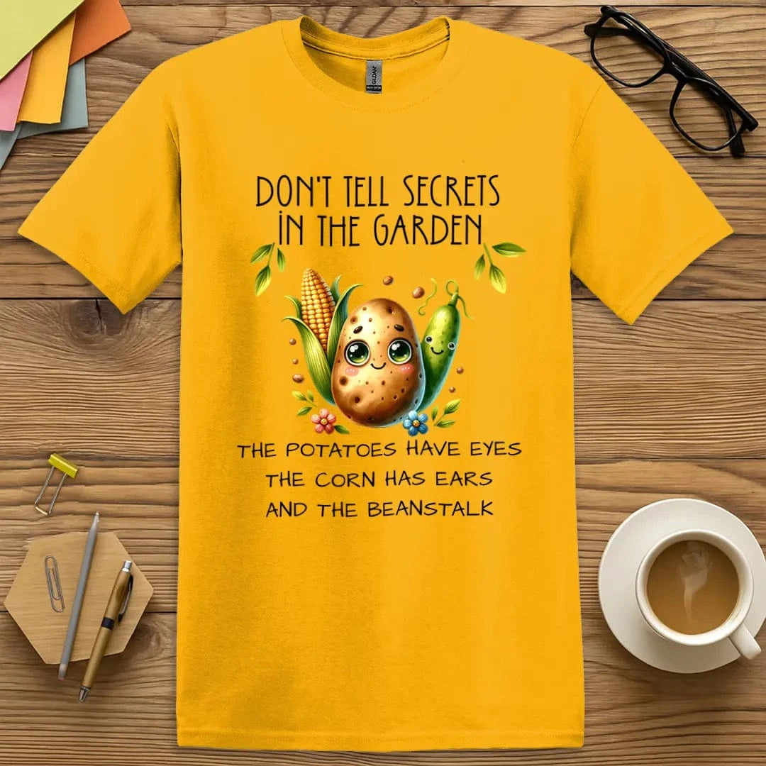 Gold Color T-Shirt with "Don't Tell Secrets in the Garden" design shining with sunny charm and giggle-worthy garden graphics.