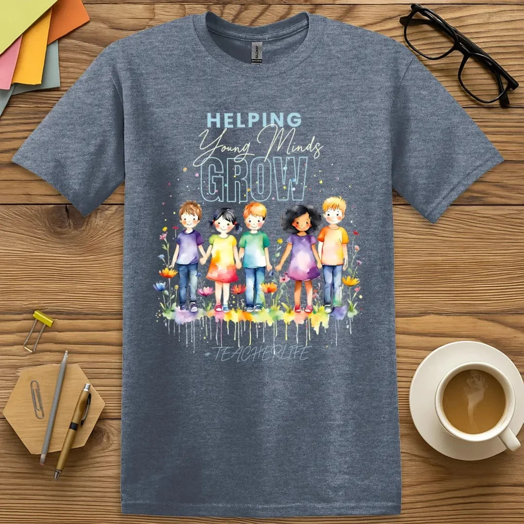 Heather Indigo Color T-shirt with "Helping Young Minds Grow" design featuring dreamy watercolor aesthetic and educational inspiration.