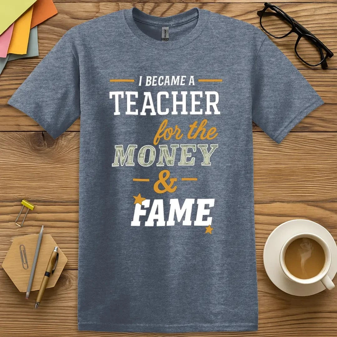 Heather Indigo Color T-Shirt with "I became a teacher for the money and fame" design blending rich tones with dry teacher wit.