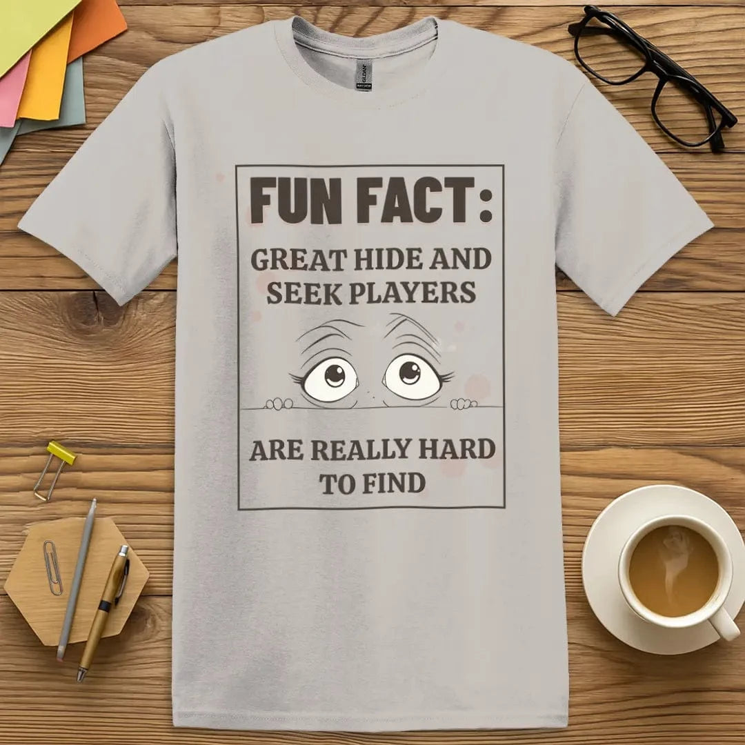 Ice Grey Color T-Shirt with "Fun Fact: Great Hide and Seek Players Are Really Hard to Find" design delivering soft tones and pun-filled stealth energy.