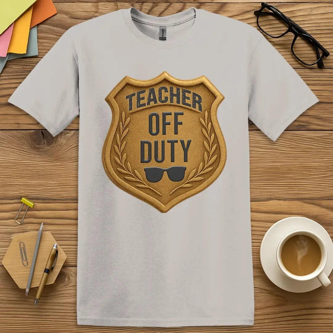 Ice Grey T-shirt with “Teacher Off Duty” design featuring cool tones and classic teacher self-care messaging