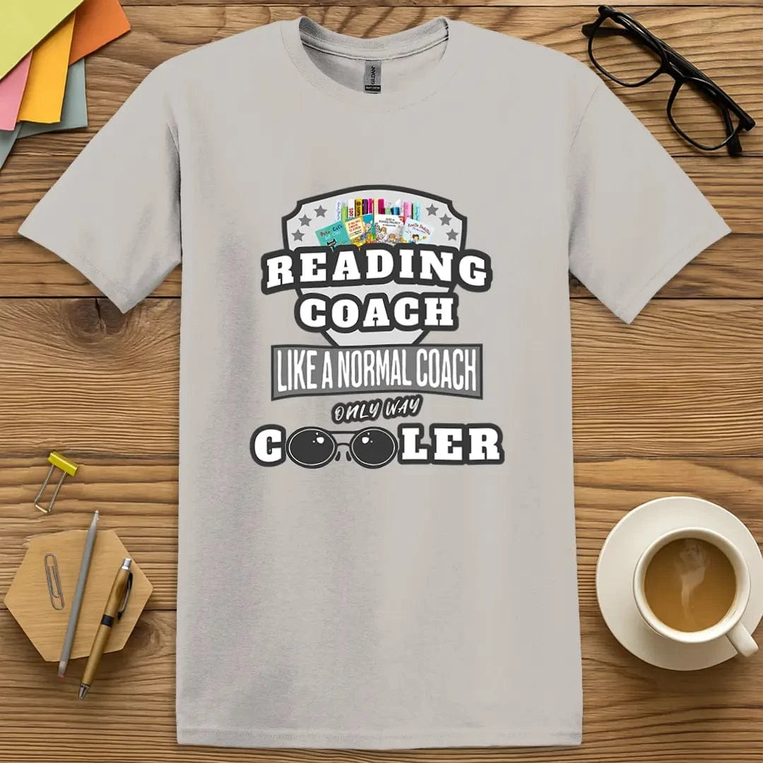 Ice Grey T-shirt with “READING COACH: Like a Normal Coach, Only Way Cooler” design featuring bold and witty literacy pride