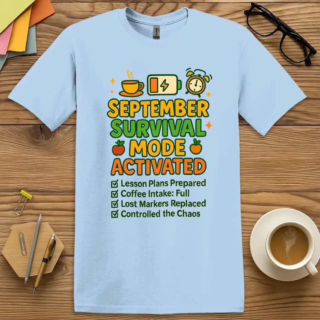 Light blue teacher shirt with checklist and icons – September Survival Mode Activated, coffee, battery, alarm clock, apples, and teacher checklist