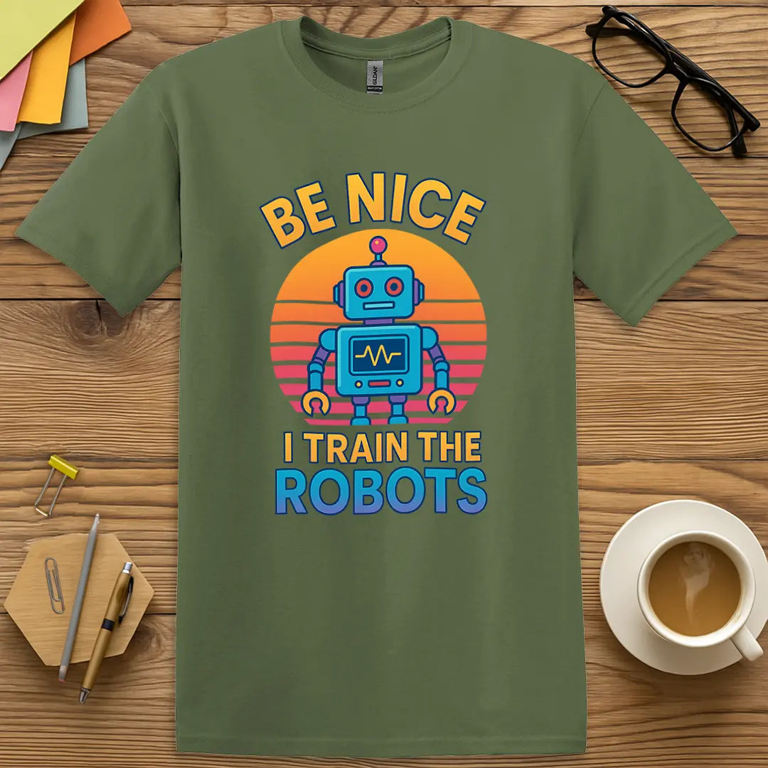 Military Green Color T-Shirt with "Be Nice I Train The Robots" design offering a tactical twist on classroom tech leadership.
