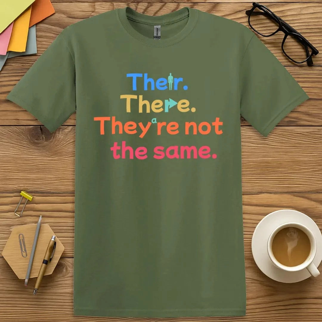 Military Green Color T-shirt with "Their. There. They're not the same." design offering earthy tone with grammar sass.