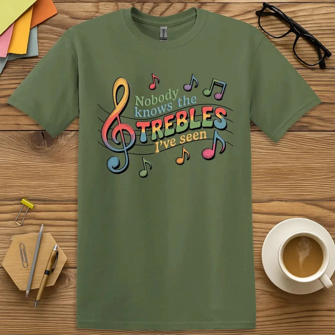 Military Green Color T-Shirt with "Nobody Knows the Trebles I've Seen" design mixing earthy tones with music pun energy.