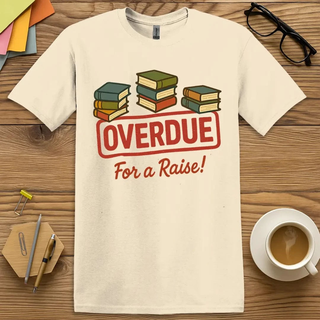 Natural T-shirt with "Overdue for a Raise!" design delivering soft neutral tones and witty educator message.