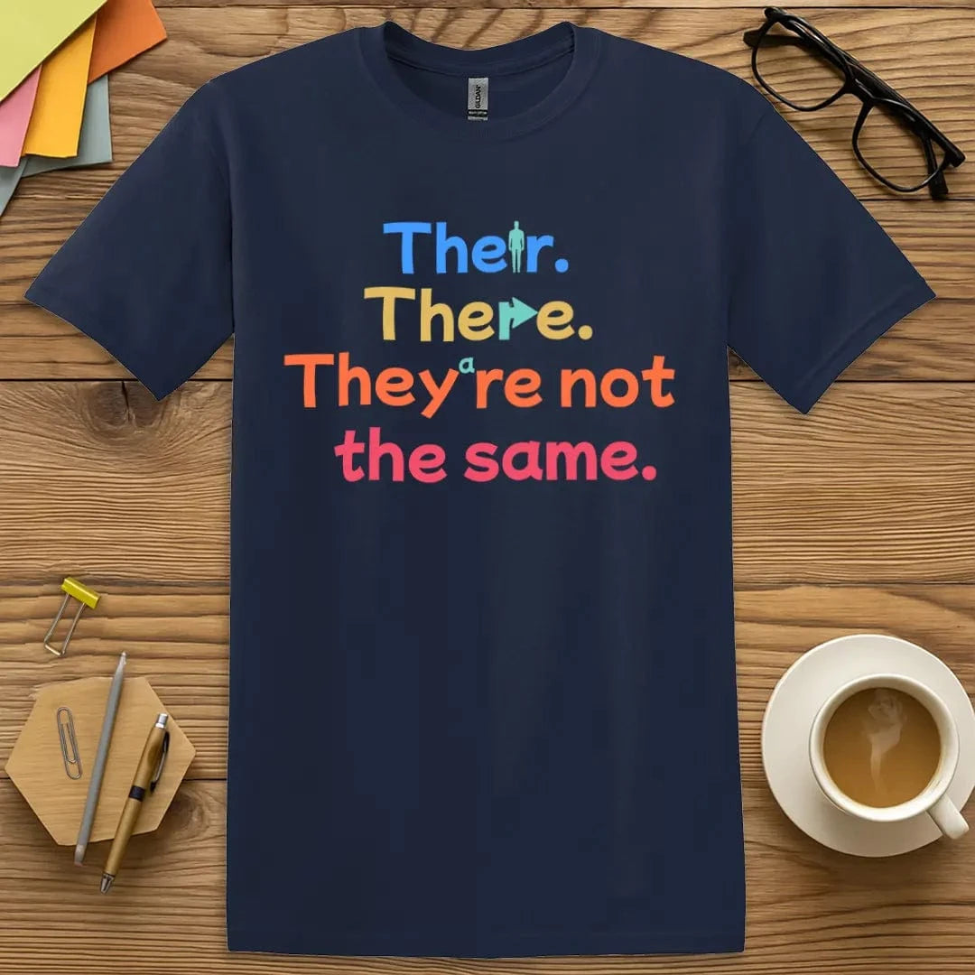 Navy Color T-shirt with "Their. There. They're not the same." design featuring colorful homophone correction graphics.