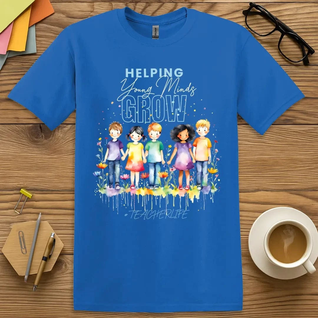 Royal Color T-shirt with "Helping Young Minds Grow" design displaying vibrant blooms and student unity in artistic style.
