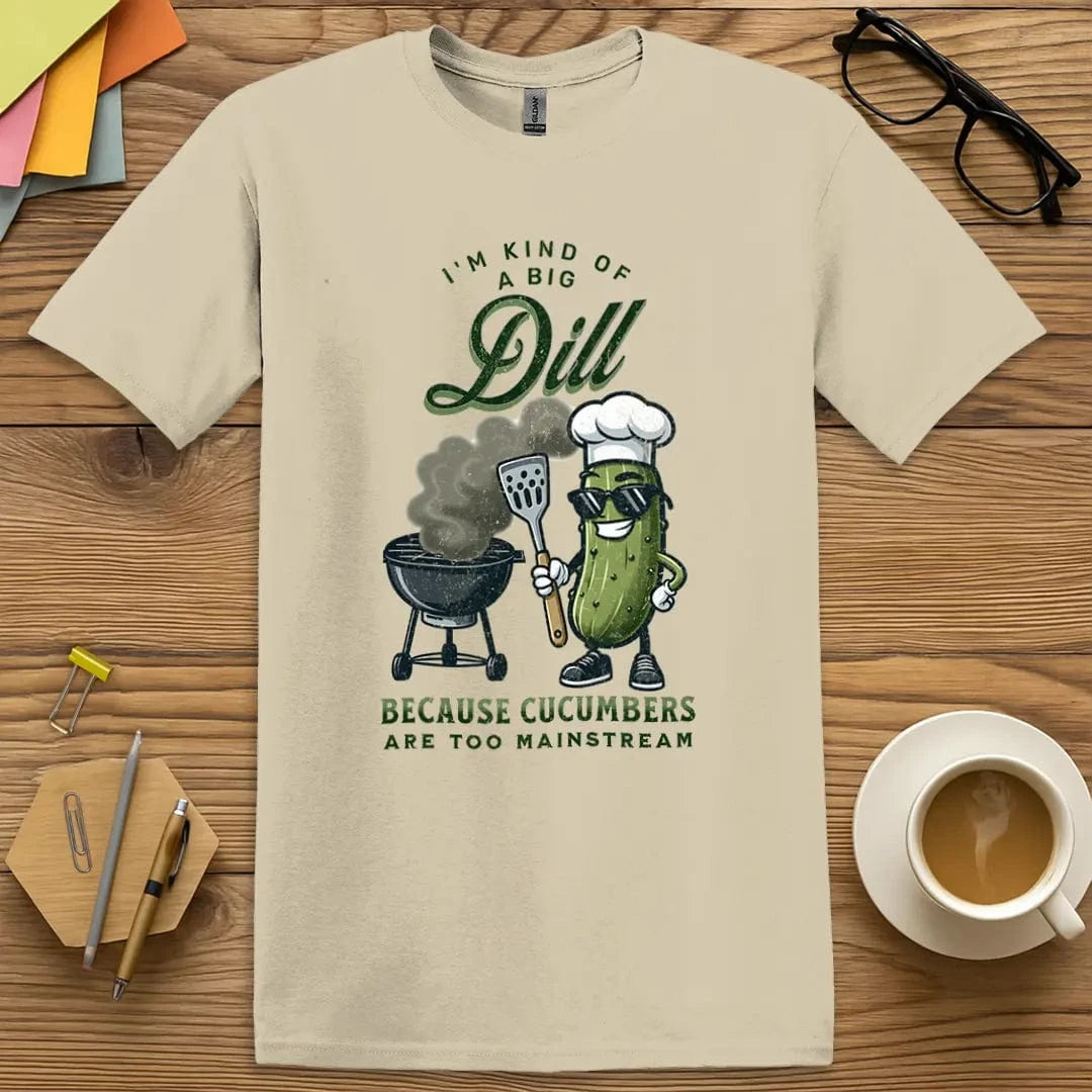 Sand T-shirt with "I'm Kind of a Big Dill" design with earthy warmth and pun-forward energy.