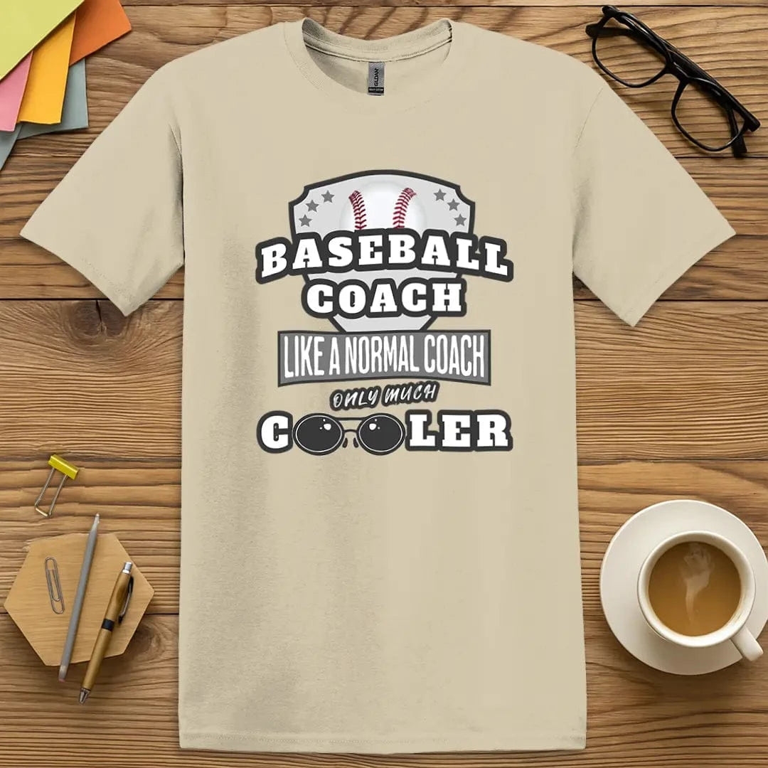 Sand Color T-Shirt with "Baseball Coach Like a Normal Coach Only Much Cooler" design featuring casual tones and laid-back field day flair.