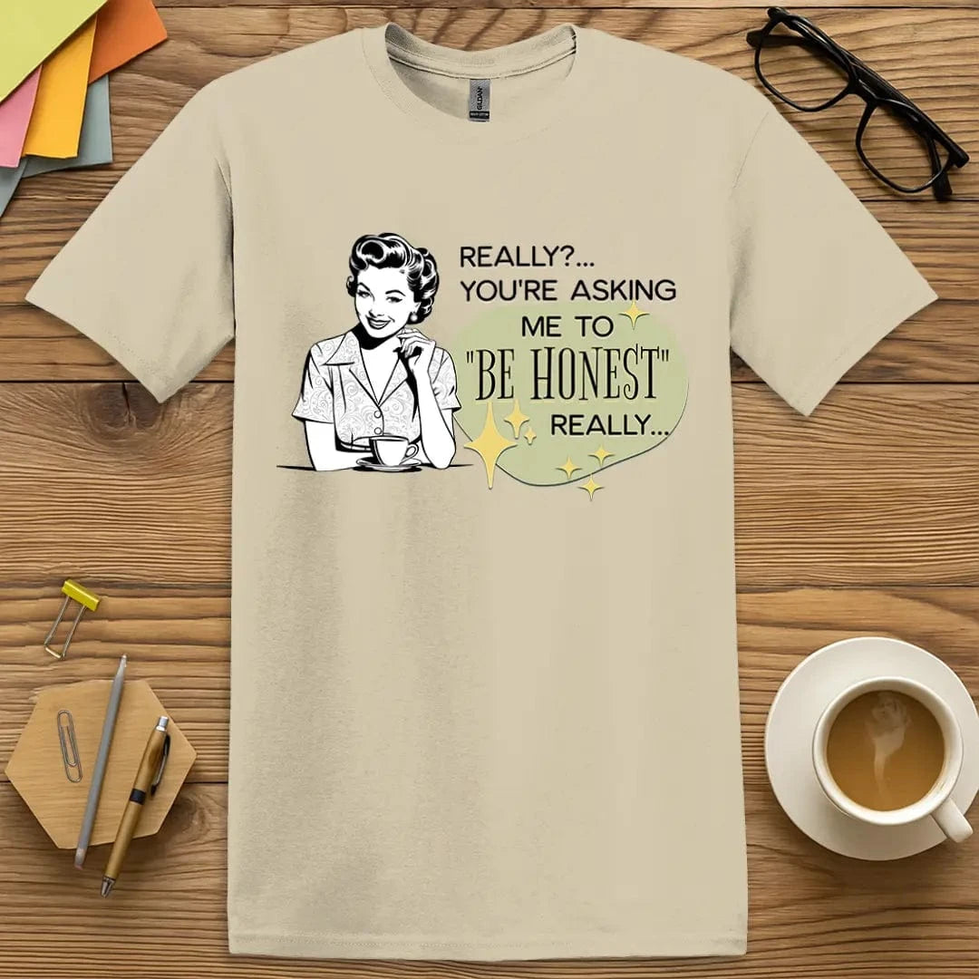 Sand Color T-shirt with "Really? You're Asking Me to Be Honest?" design offering neutral retro tones and classic educator sarcasm.