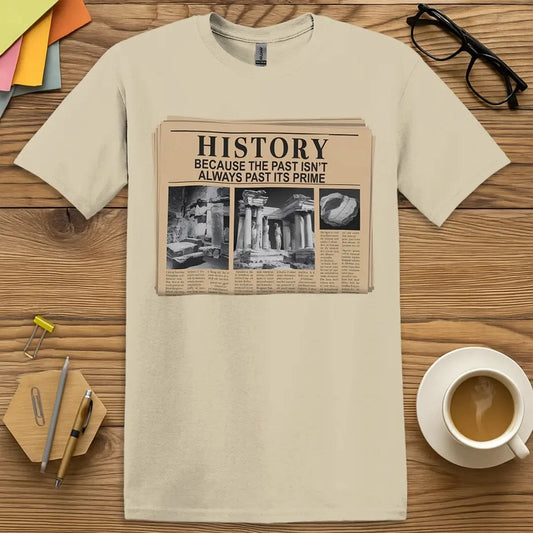 Sand Color T-Shirt with "History: Because the past isn’t always past its prime" design featuring vintage newspaper style and historical imagery.