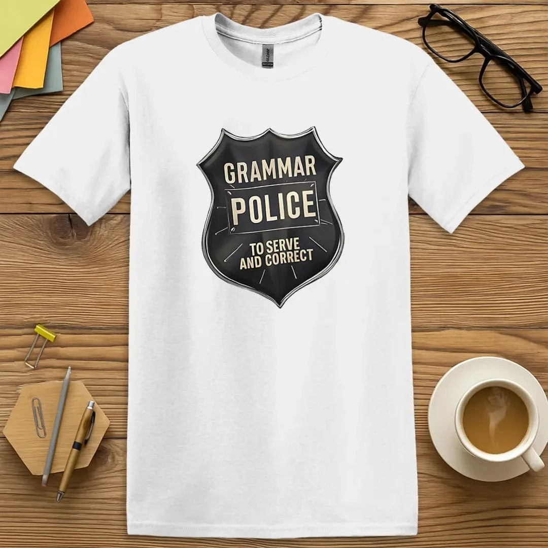 Navy T-shirt with "Grammar Police - To Serve and Correct" badge design featuring bold black shield and educational authority vibes.