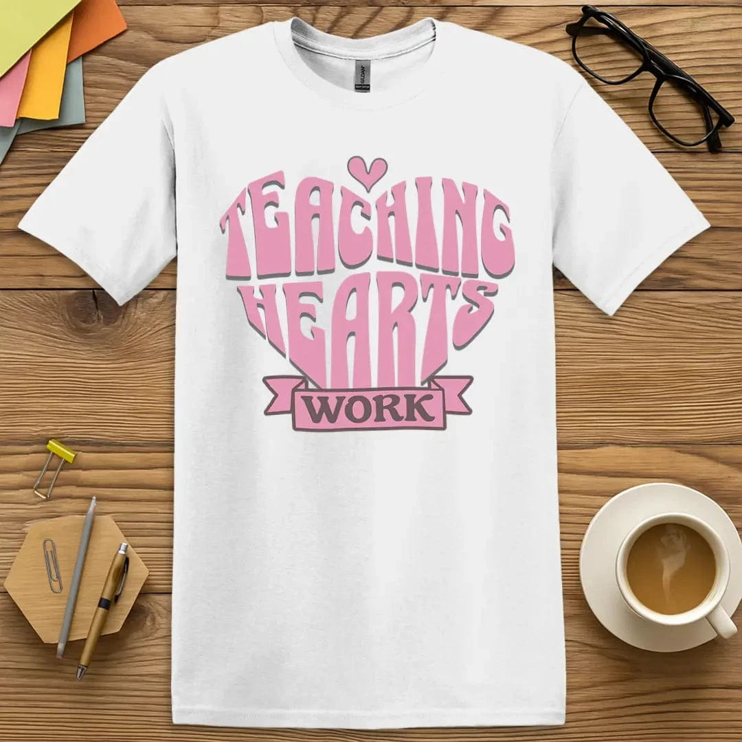 White Color T-shirt with "Teaching Hearts Work" design with crisp background and bold pink lettering.