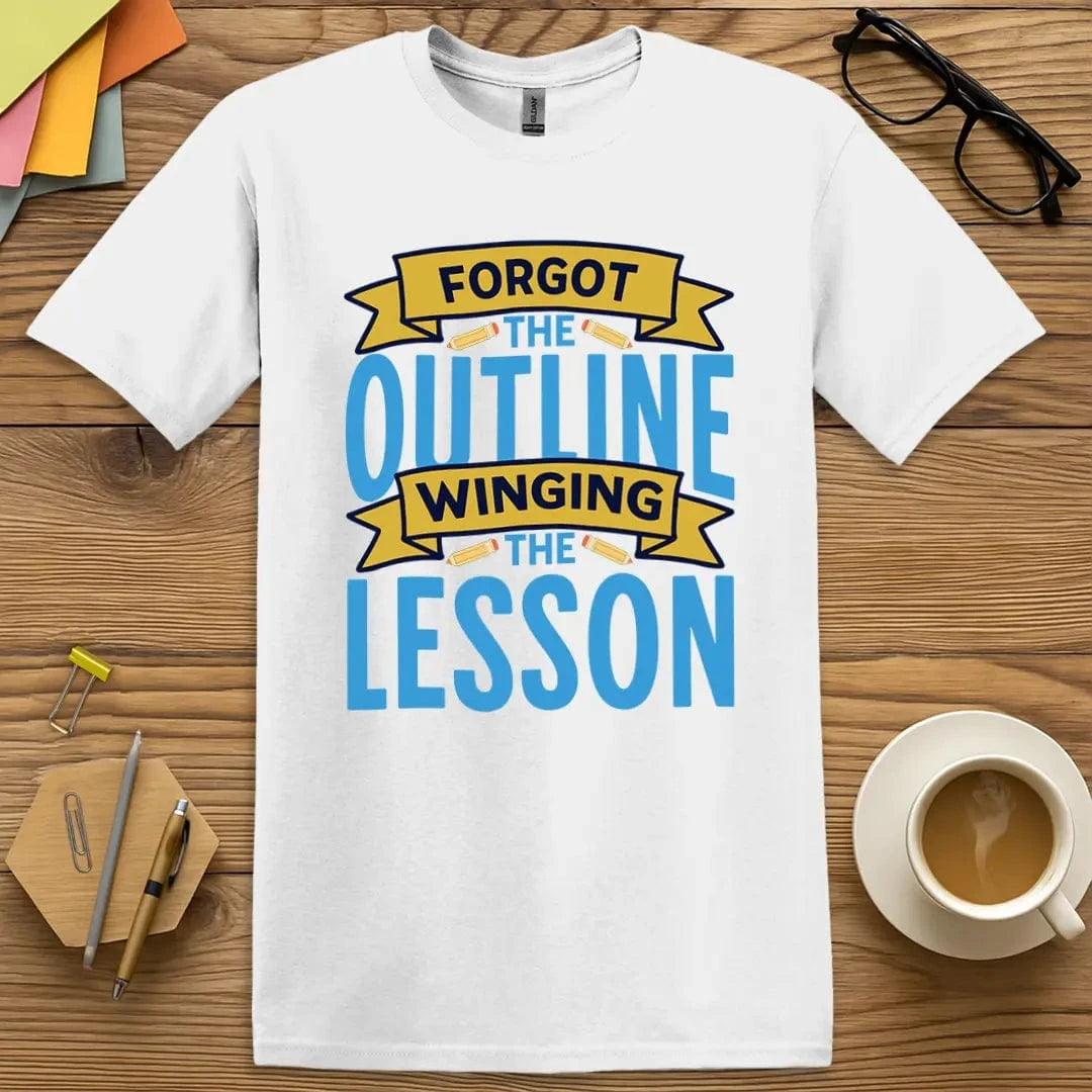 White Color T-Shirt with bold blue and yellow "Forgot the Outline, Winging the Lesson" text and pencil graphics.