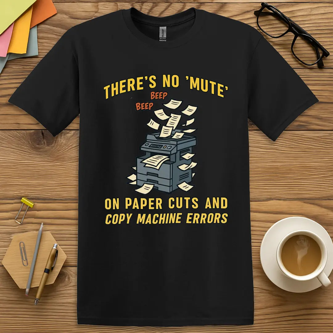 Black Color T-Shirt with "There's No 'Mute' on Paper Cuts and Copy Machine Errors" design featuring bold yellow text and a chaotic copier illustration.