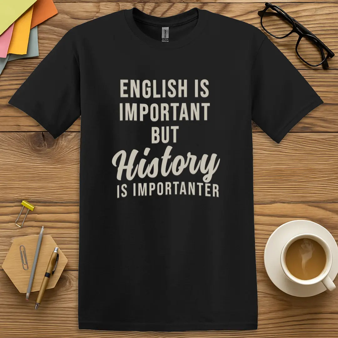 Black T-shirt with "English is important but History is importanter" design highlighting crisp contrast and witty teacher humor.
