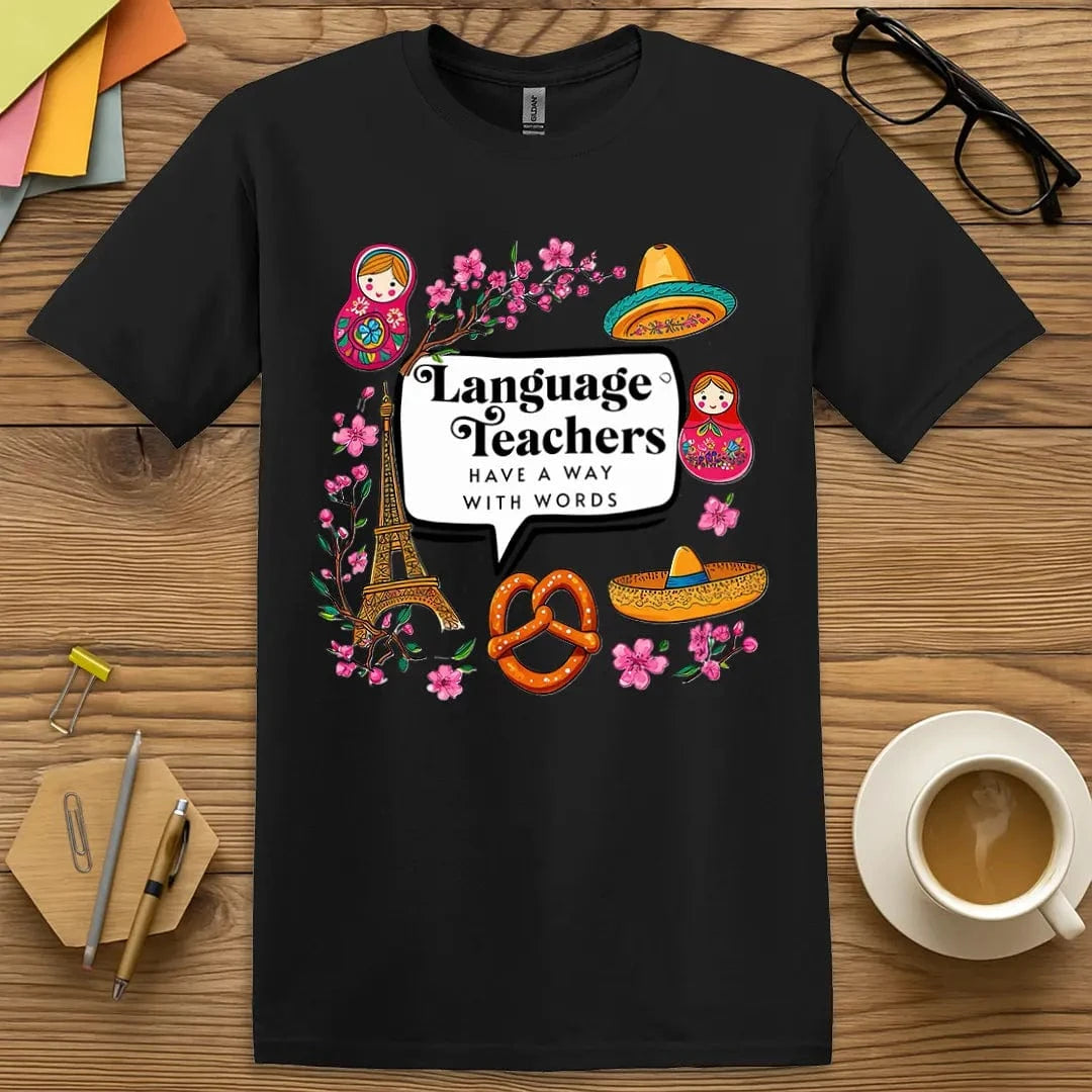 Black T-shirt with “Language teachers have a way with words” design featuring bold fonts and iconic visuals for language-loving educators  