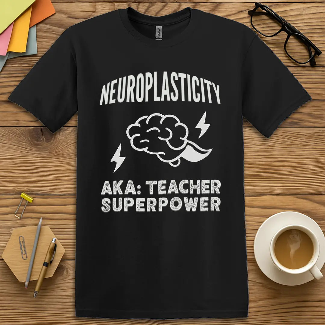 Black Color T-shirt with "Neuroplasticity AKA Teacher Superpower" design featuring sleek look and classroom brainpower punchline.