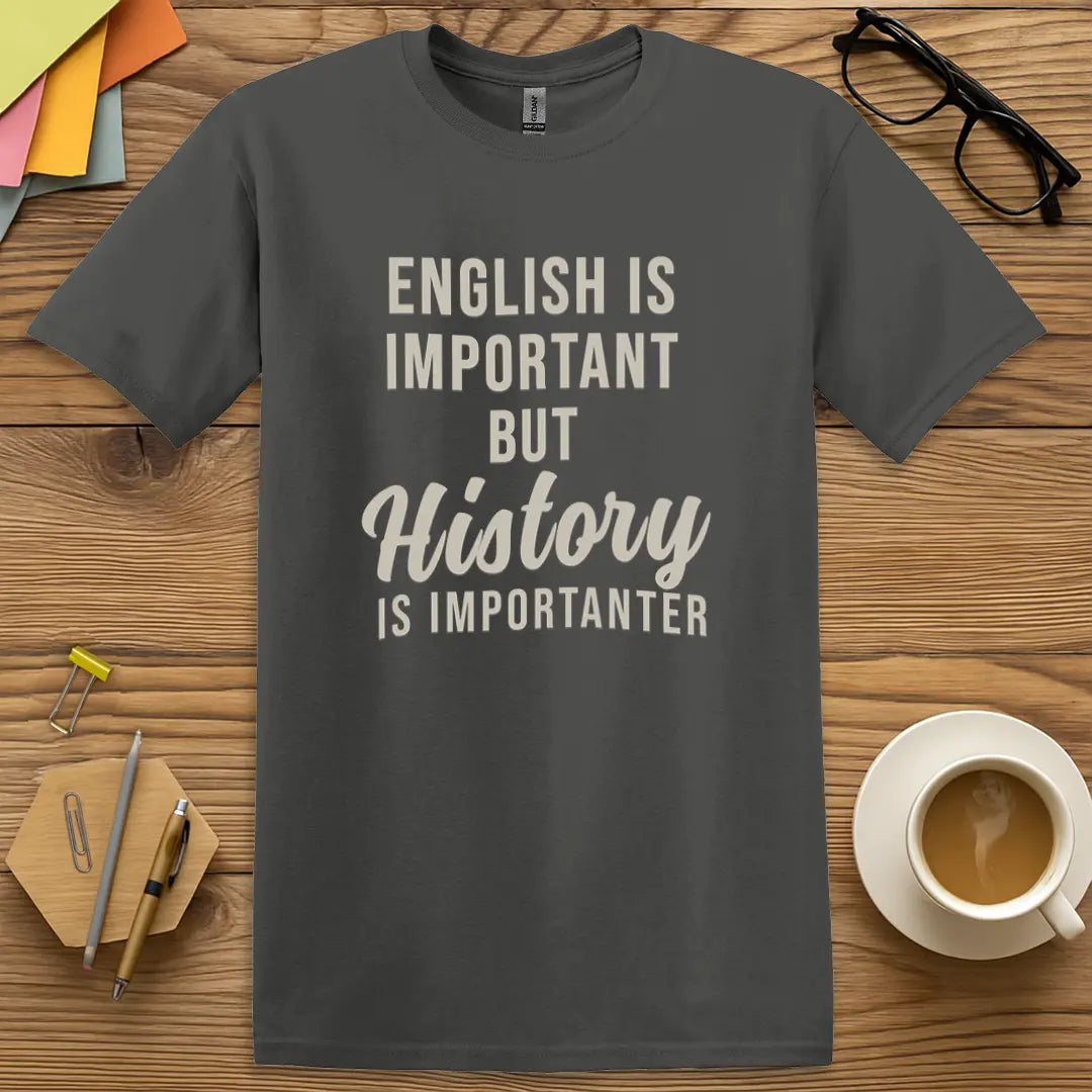 Charcoal T-shirt with "English is important but History is importanter" design offering a sleek backdrop for subject rivalry.