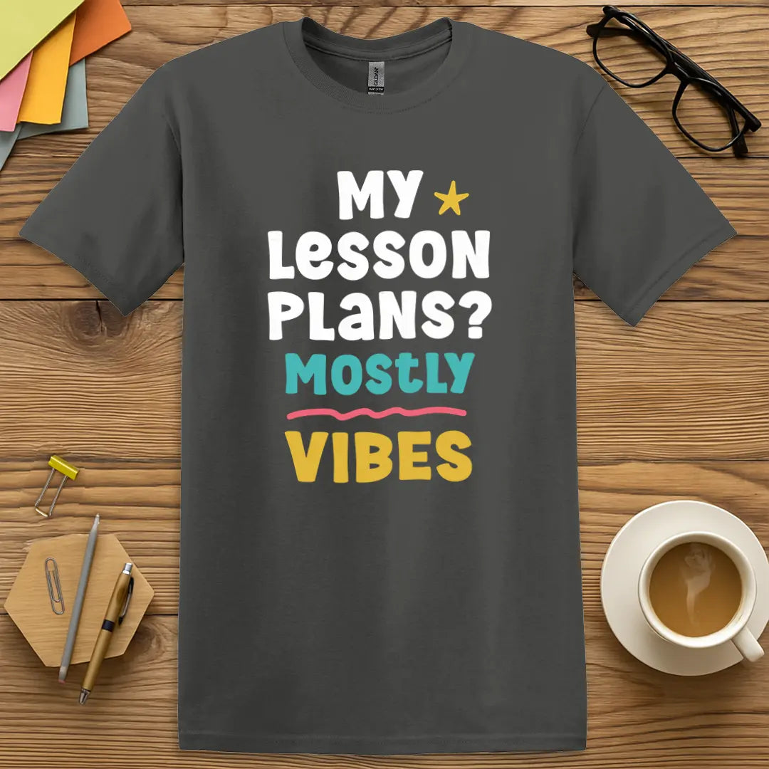 Charcoal Color T-shirt with "My Lesson Plans? Mostly Vibes" design offering dark tone contrast and relatable educator humor.
