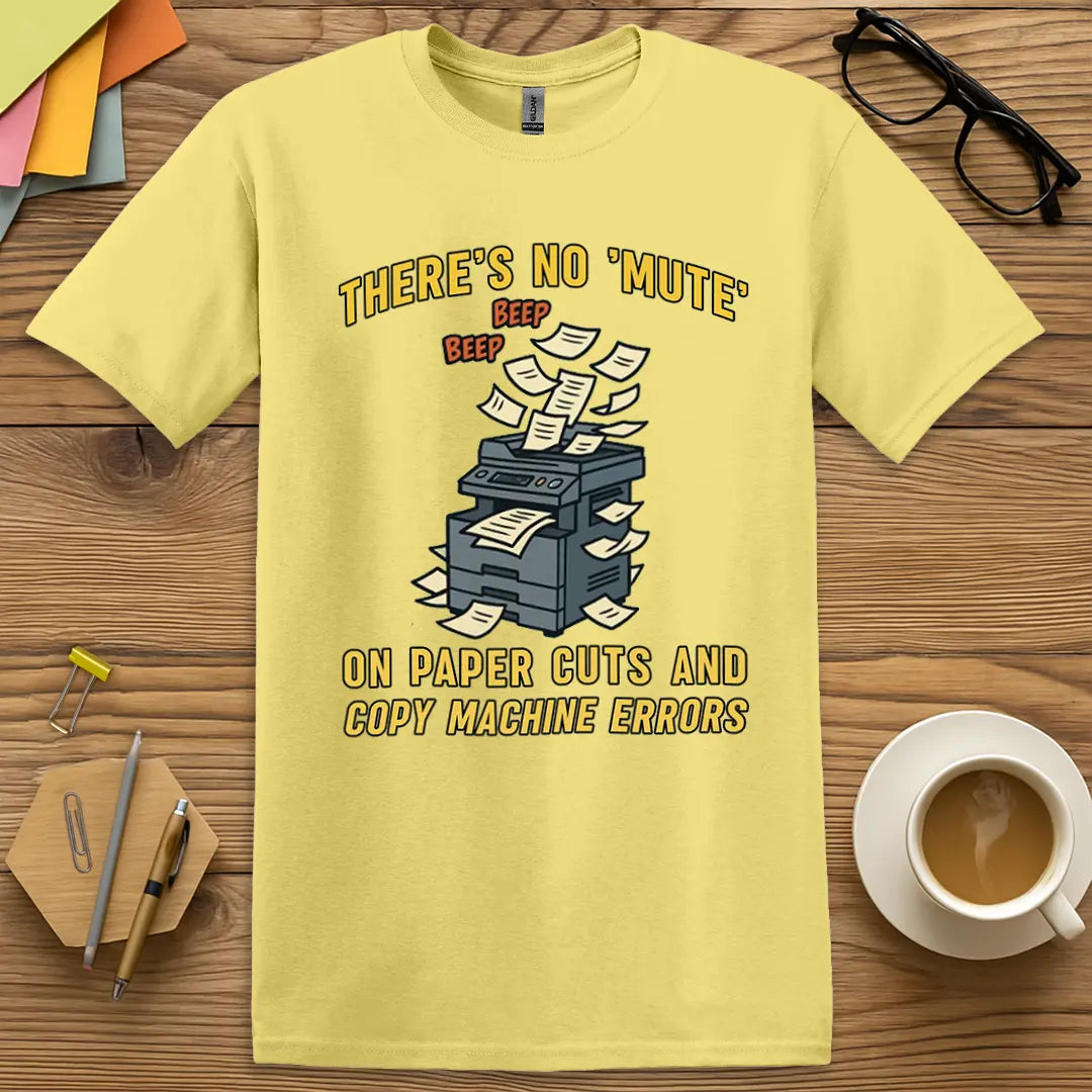 Cornsilk Color T-Shirt with "There's No 'Mute' on Paper Cuts and Copy Machine Errors" design featuring colorful copy machine meltdown vibes.