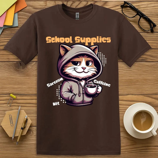 Dark Chocolate Color T-Shirt with "School Supplies" design featuring cool cartoon cat in hoodie holding coffee, surrounded by words sarcasm, wit, caffeine.