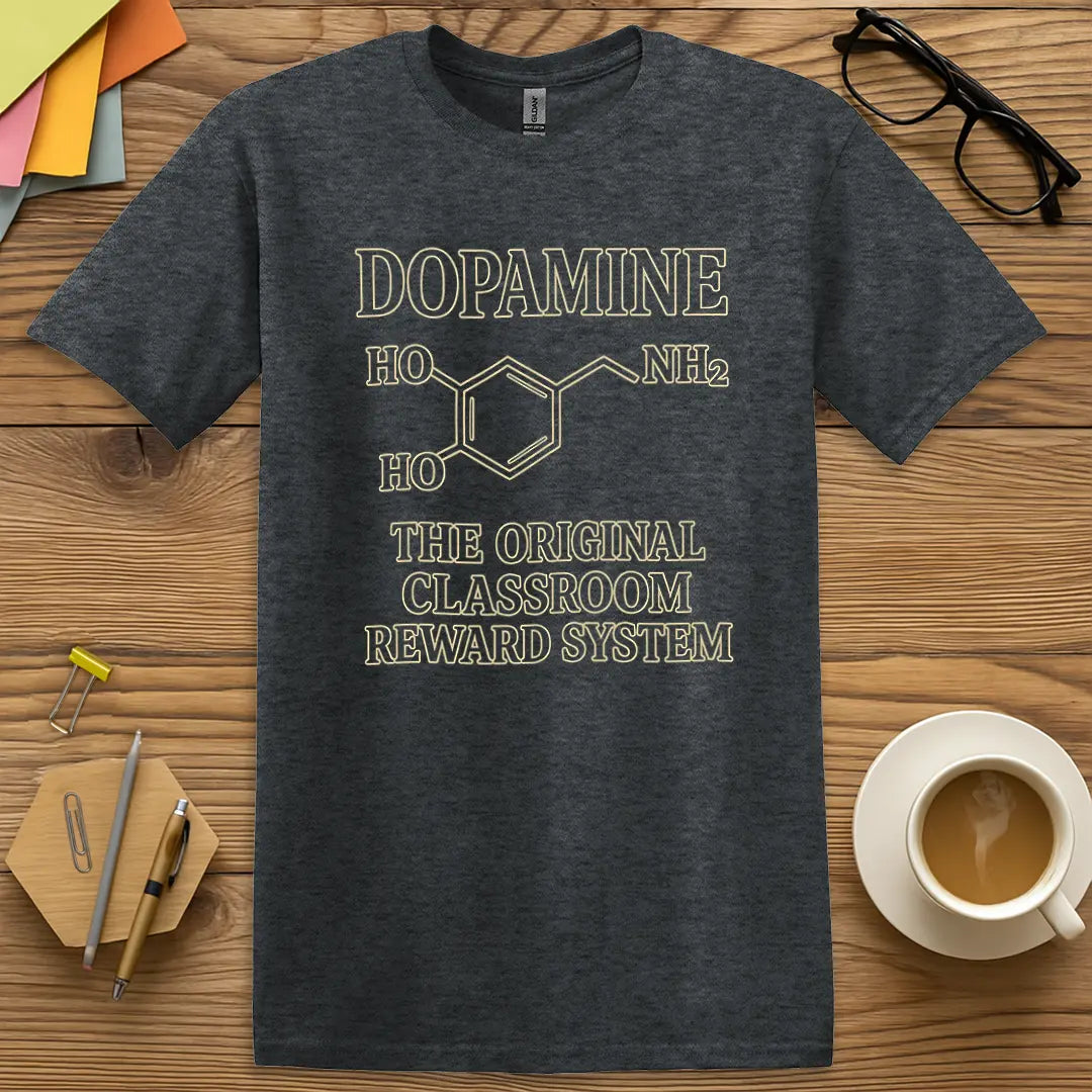 Dark Heather Color T-shirt with "Dopamine: The Original Classroom Reward System" design blending cozy tones with clever science snark.