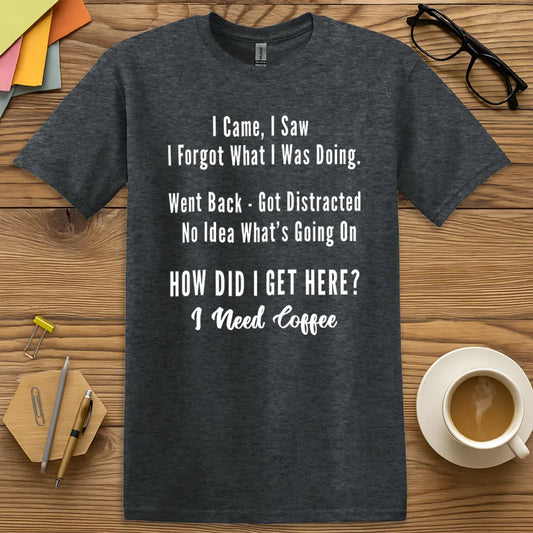Dark Heather T-shirt with "How Did I Get Here? I Need Coffee" design featuring bold stacked text and chaotic teacher brain humor.
