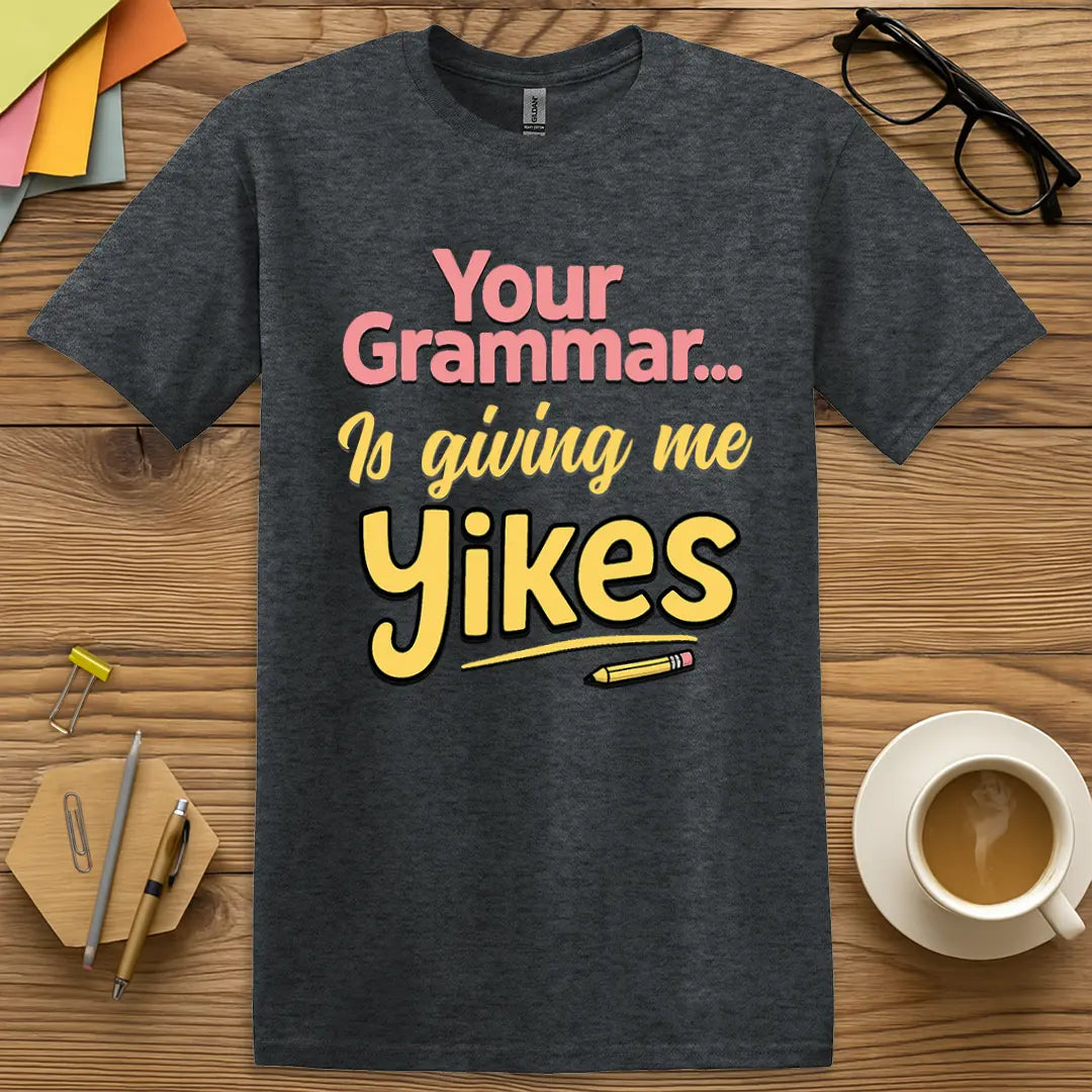 Dark Heather Color T-shirt with "Your Grammar Is Giving Me Yikes" design mixing cozy fabric with grammar police vibes