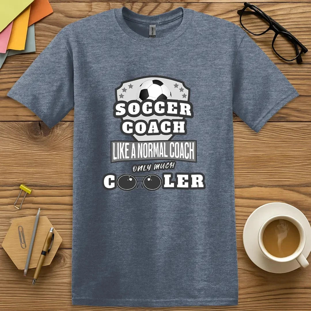 Heather Indigo T-shirt with “Soccer Coach” design featuring bold, motivational style and off-duty clipboard charisma
