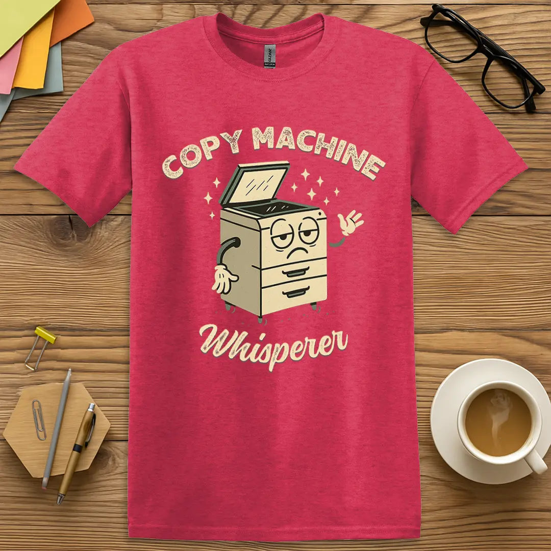 Heather Red T-shirt with "Copy Machine Whisperer" design capturing copier chaos charm and educator humor.