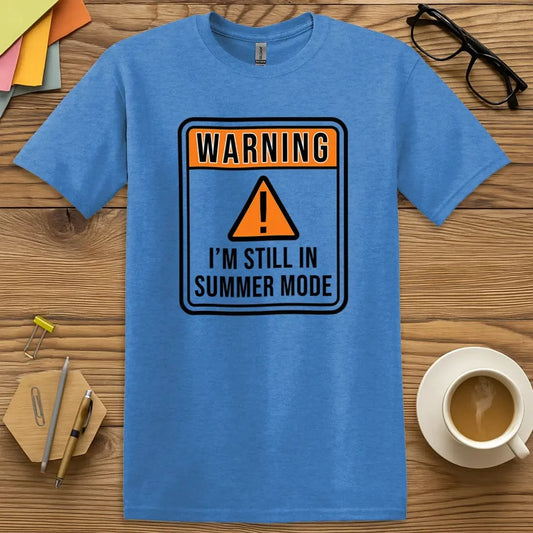 Heather Royal T-shirt with “Warning: I’m Still in Summer Mode” design featuring relaxed, back-to-school teacher humor  